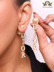Long gold enamel alphabet C and D pearl earrings