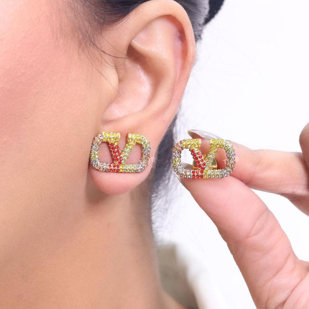 Alphabet V multi coloured studs