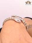 Platinum Snake head cz bracelet with emerald detailing