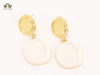 White enamel and gold earrings