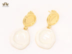 White enamel and gold earrings
