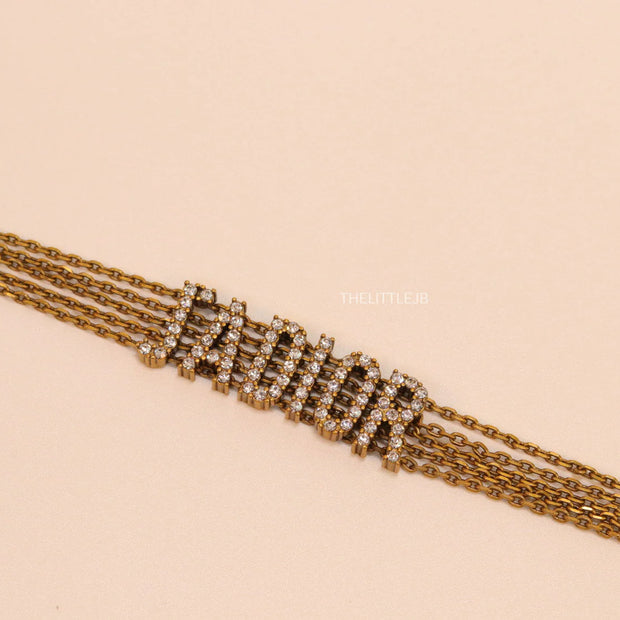 Multichain bracelet with cz alphabet CD in antique gold finish