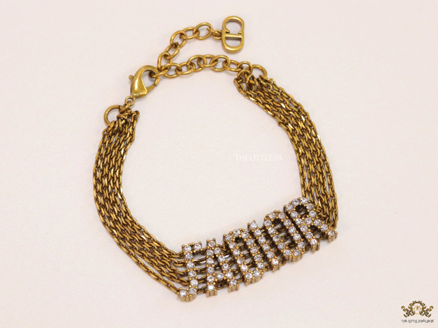 Multichain bracelet with cz alphabet CD in antique gold finish
