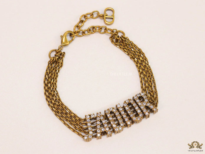 Multichain bracelet with cz alphabet CD in antique gold finish