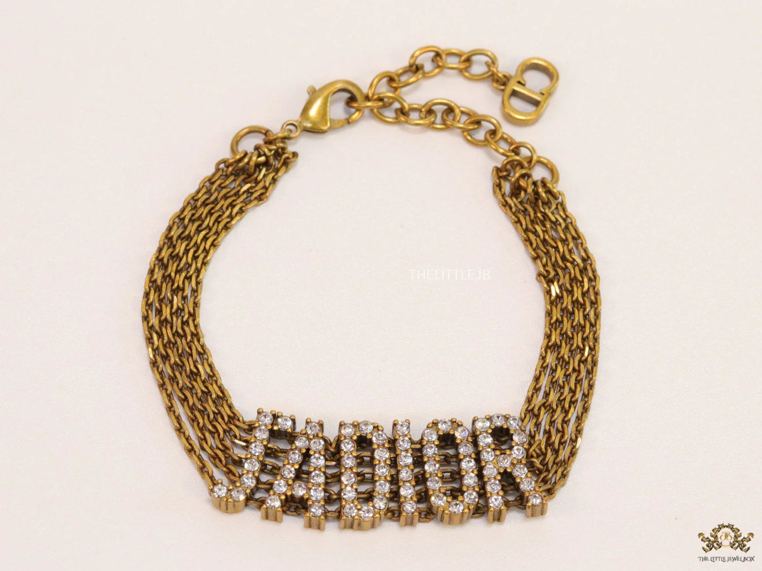 Multichain bracelet with cz alphabet CD in antique gold finish
