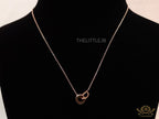 Rose gold plated D initial necklace with interlocking cz ring