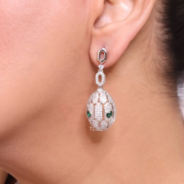Platinum Snake head pendant set with emerald detailing