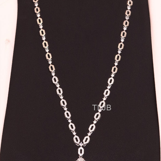 Platinum Snake head pendant set with emerald detailing