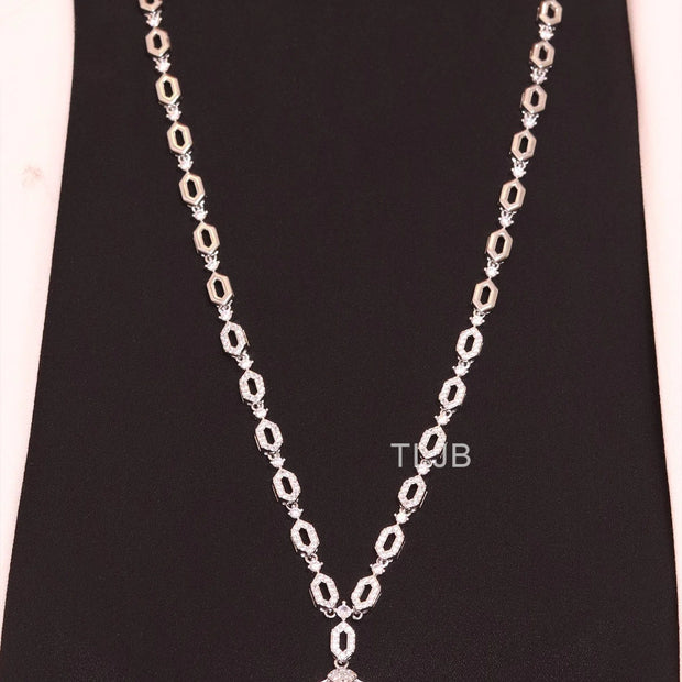 Platinum Snake head pendant set with emerald detailing