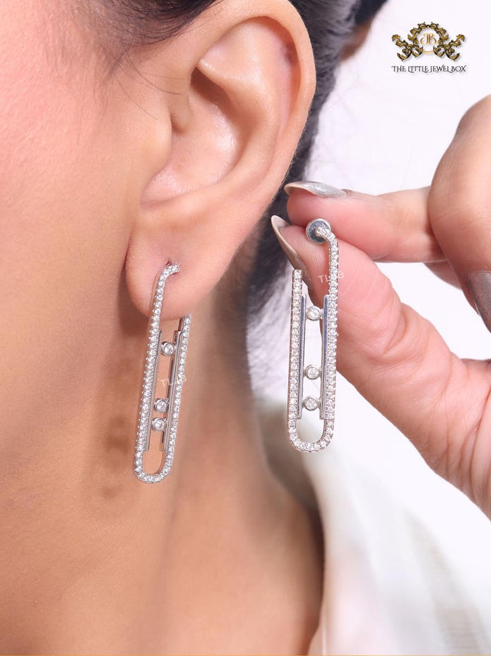 Platinum  sleek Cz earrings with 3 stones