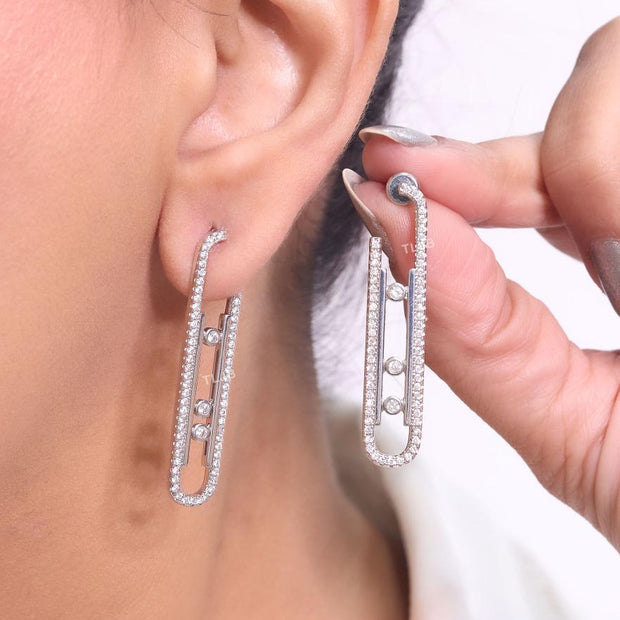 Platinum  sleek Cz earrings with 3 stones