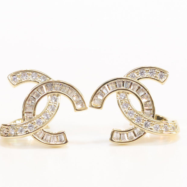 Gold plated twin C motif studs in cz and baguettes