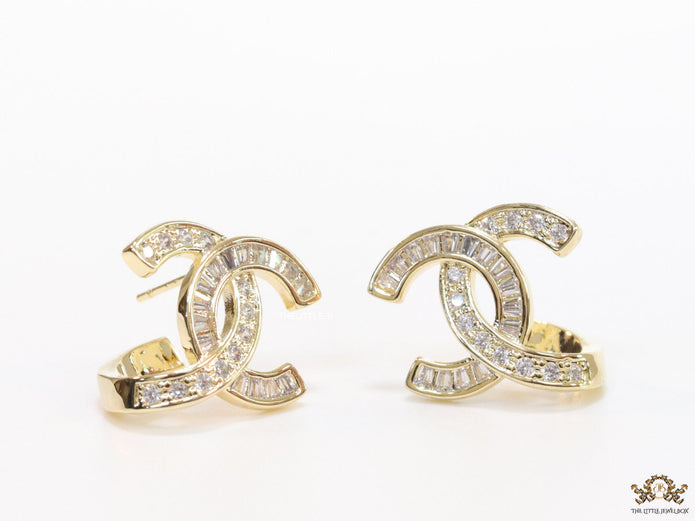 Gold plated twin C motif studs in cz and baguettes