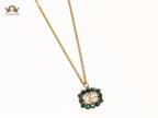 Rustic double g with green stones