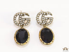Rustic double G earings with oval black drop