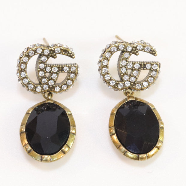 Rustic double G earings with oval black drop