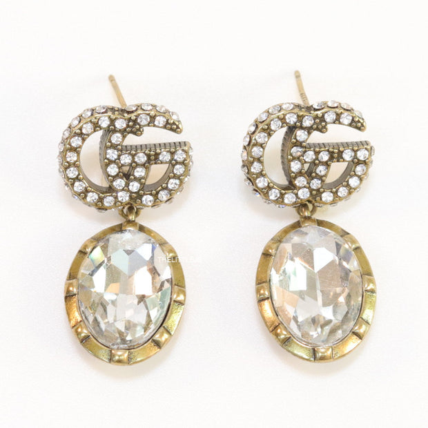 Rustic double G earrings with white drop