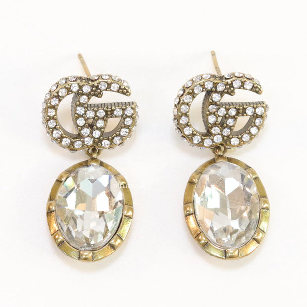 Rustic double G earrings with white drop