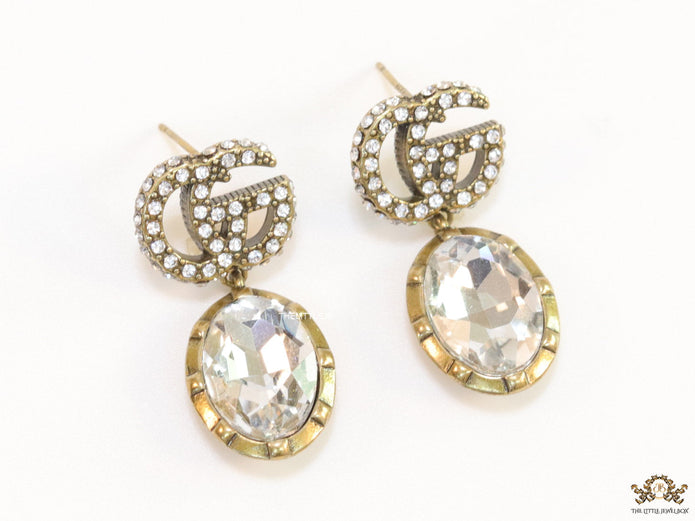 Rustic double G earrings with white drop