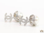 Platinum plated twin C earrings in cz with cz capped pearl drop