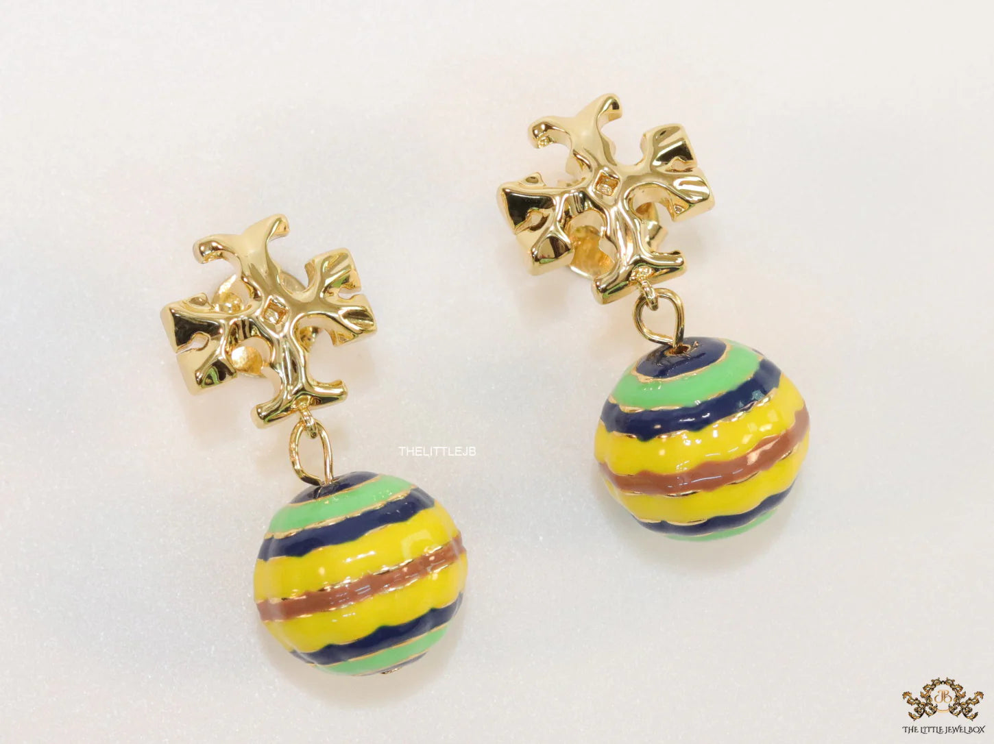Enamel coated round drop earrings in gold plating