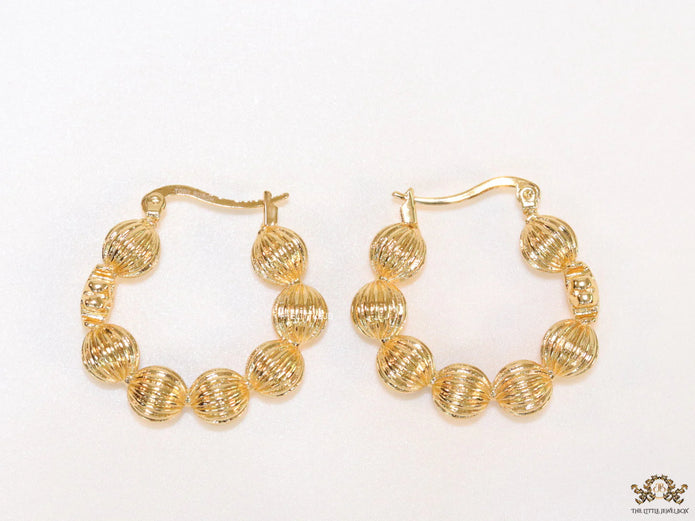 Golden beaded hoop earrings
