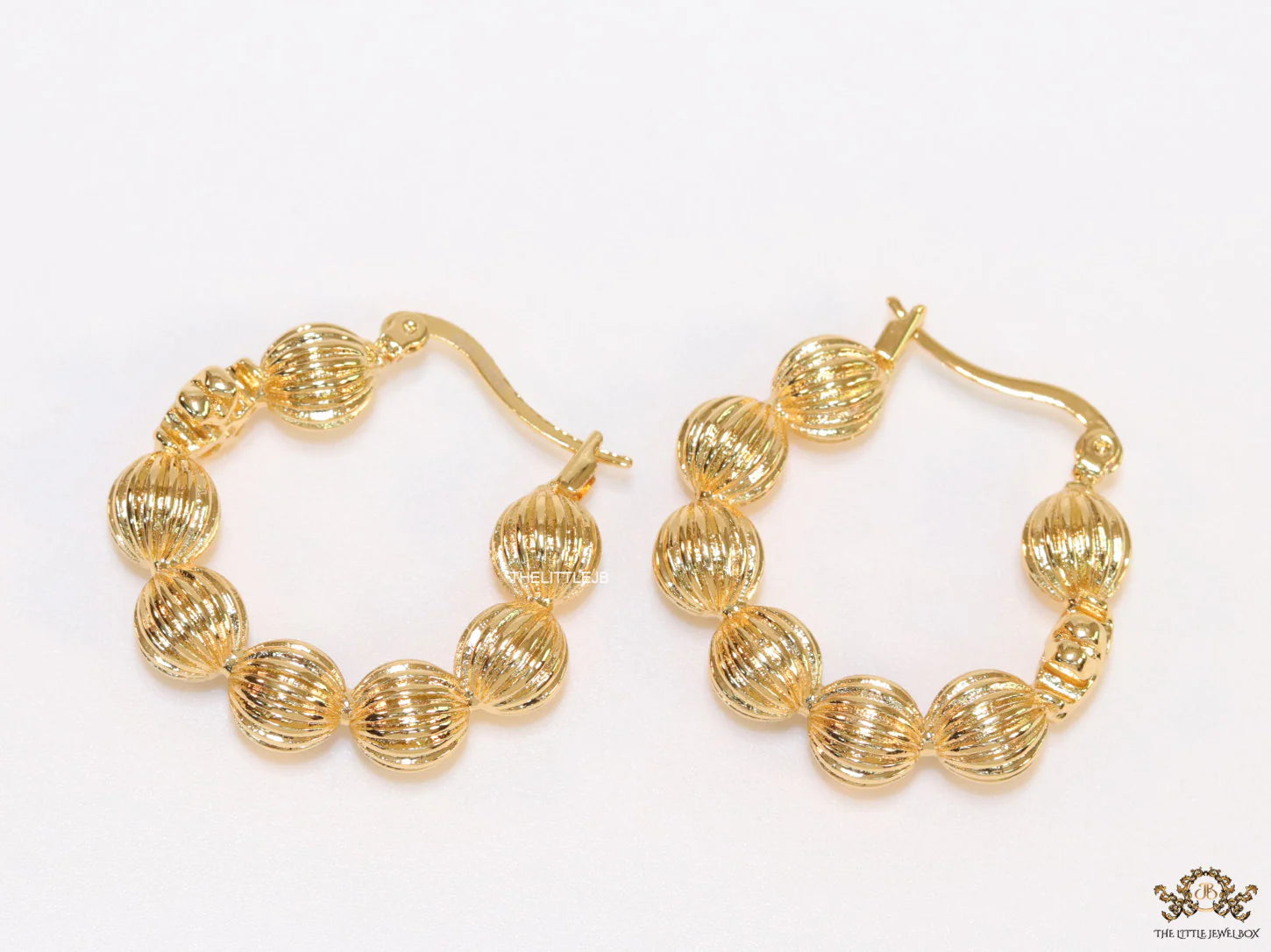 Golden beaded hoop earrings
