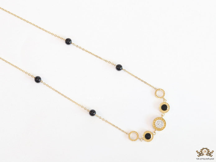 Golden chain necklace with black beads and golden alphabet discs, cz and more