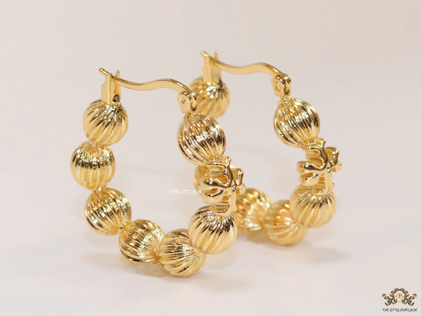 Golden beaded hoop earrings