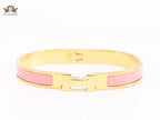 Alphabet H pink and gold 8 mm bracelet
