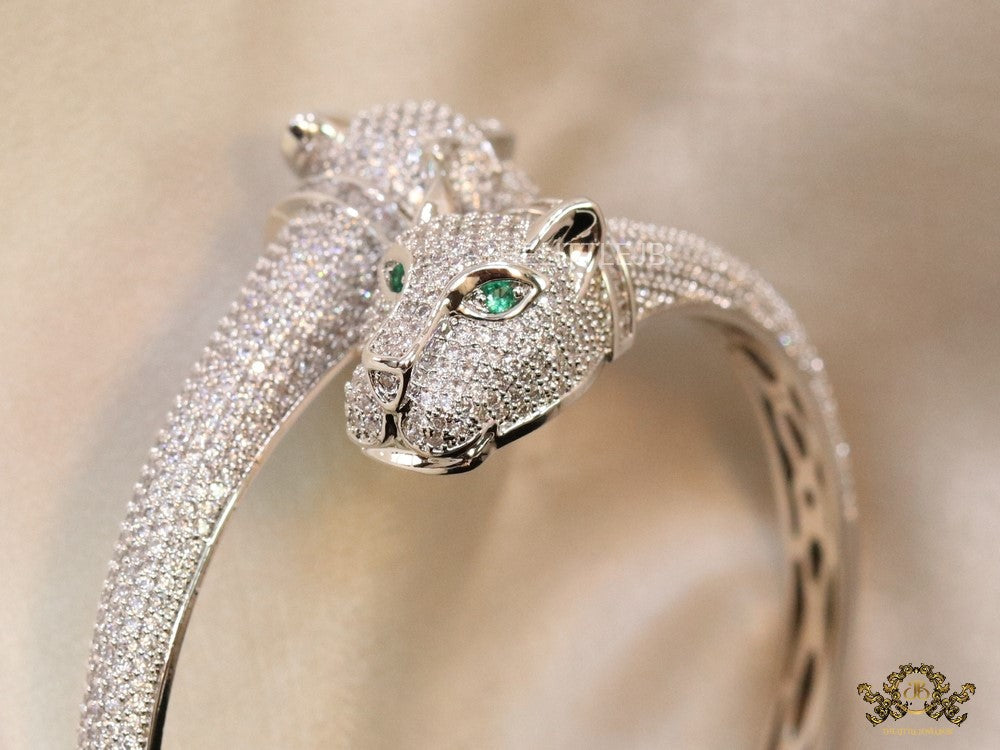 Platinum plated cz twin panther openable bracelet