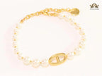 Alphabet CD pearl and gold sleek bracelet