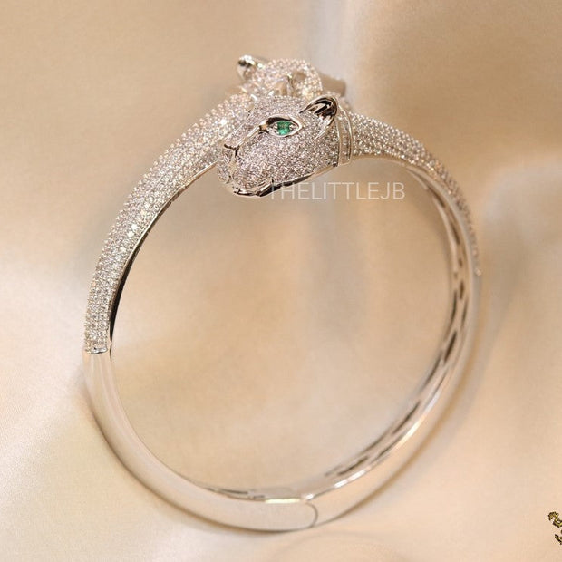 Platinum plated cz twin panther openable bracelet