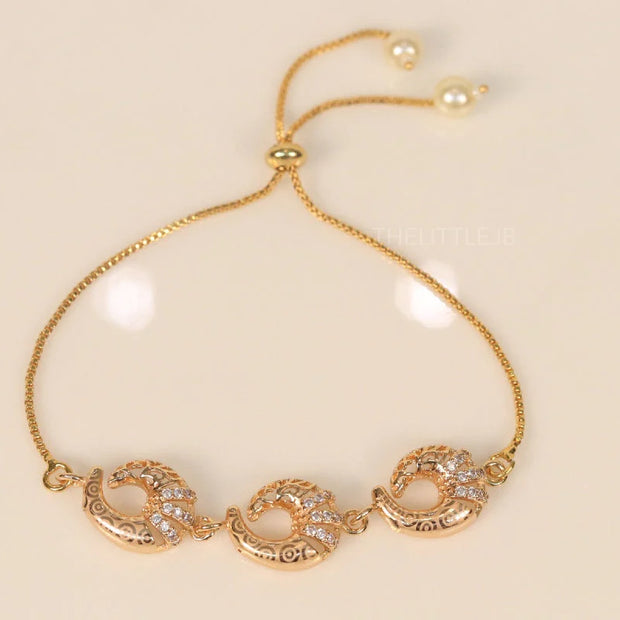 Gold plated sling bracelet with snake motifs