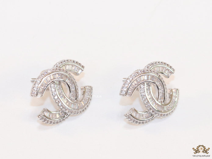 Platinum plated cz studs in twin C motif