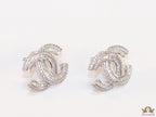 Platinum plated cz studs in twin C motif