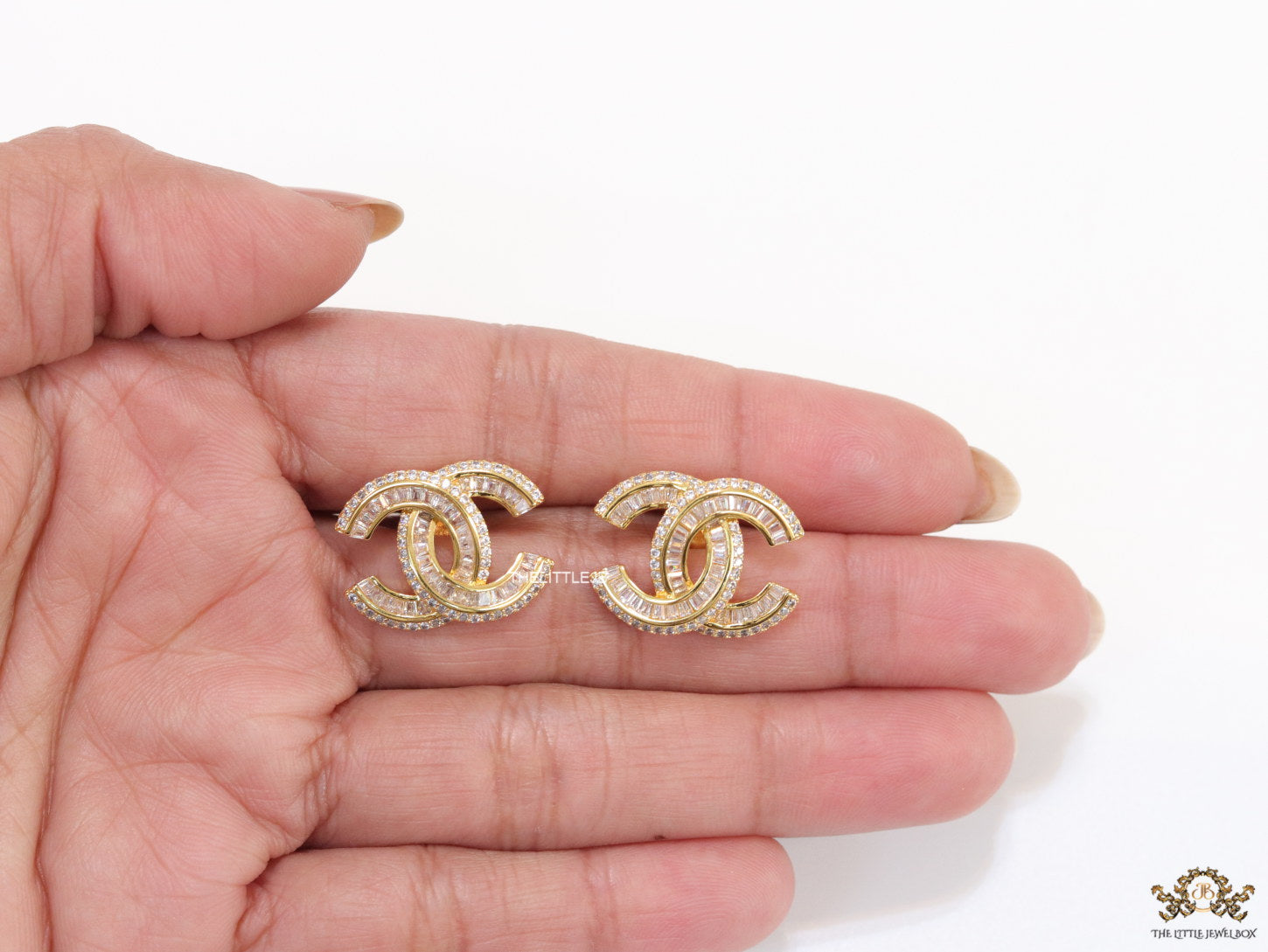 Gold plated cz studs in twin C motif