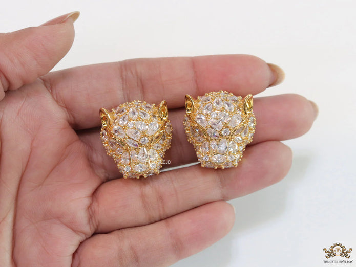 Panther head stud earrings in gold plating and cz