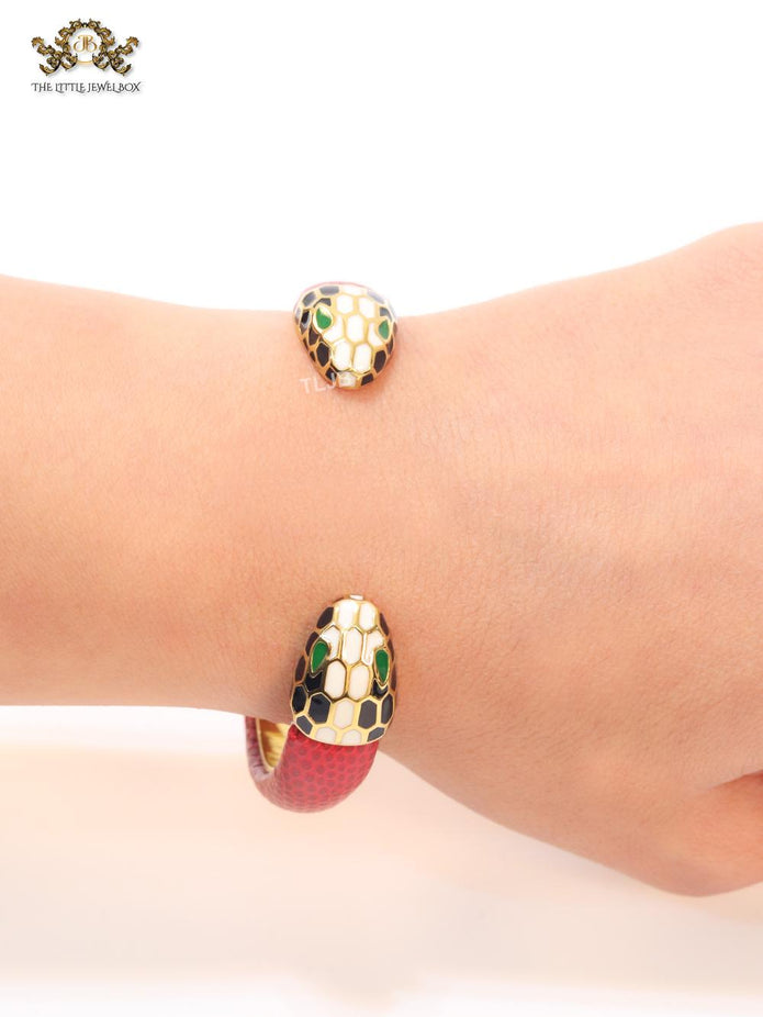 Two snake head red leather bracelet