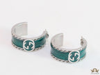 Blue green platinum studs with twin G motif
