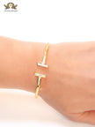 Alphabet T MOP and gold sleek bracelet