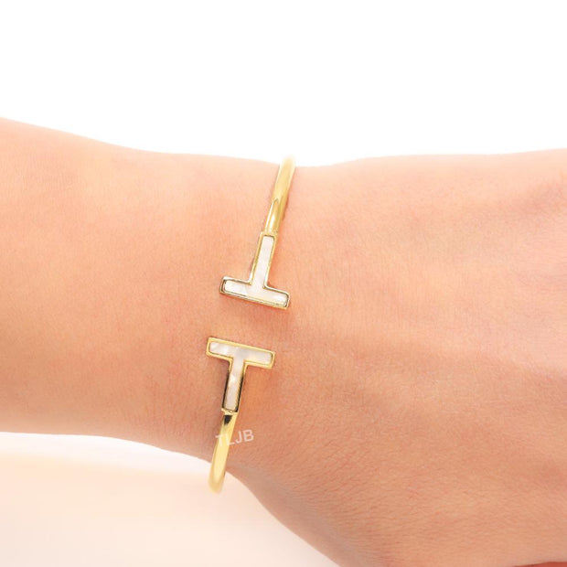 Alphabet T MOP and gold sleek bracelet