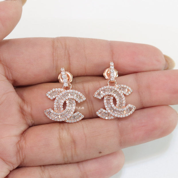 Gold plated cz dangle earrings with twin C motif