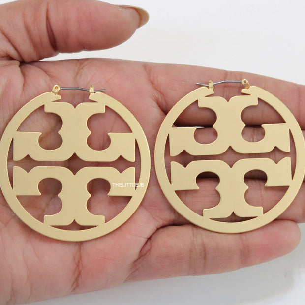 Matt Gold hoops with T motifs