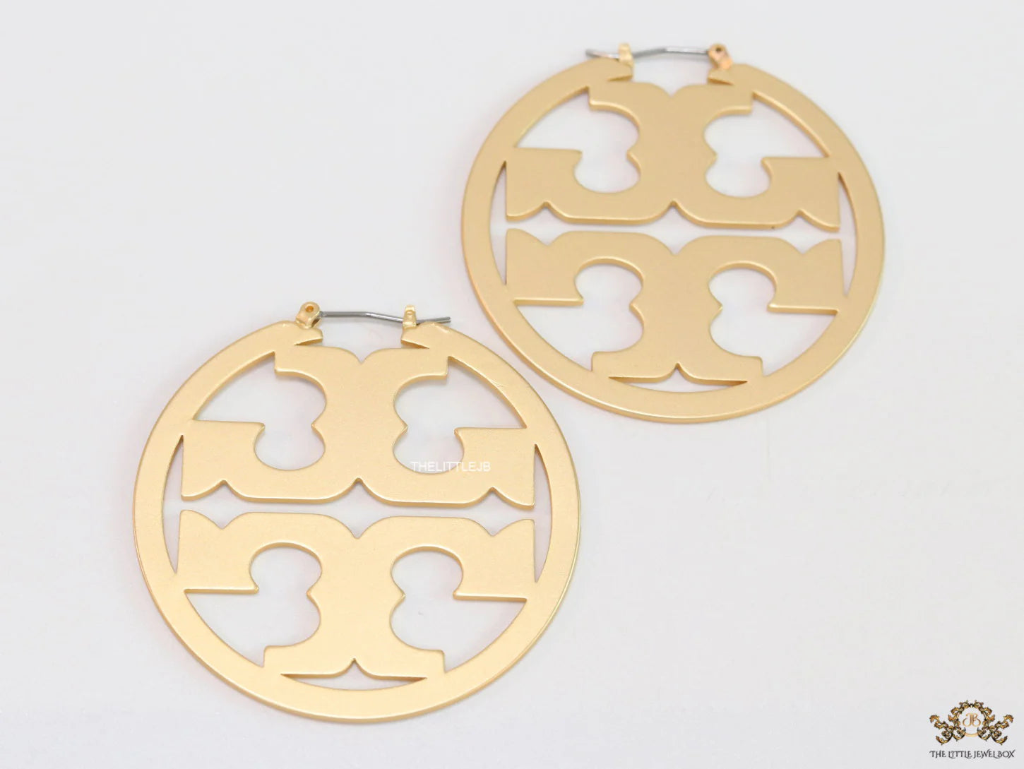 Matt Gold hoops with T motifs