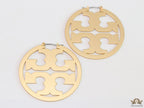 Matt Gold hoops with T motifs