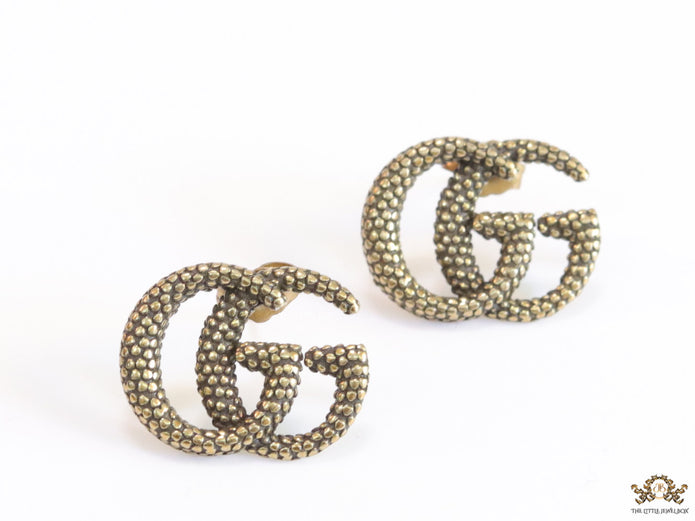 Antique gold plated double G motif studs with honey comb texture