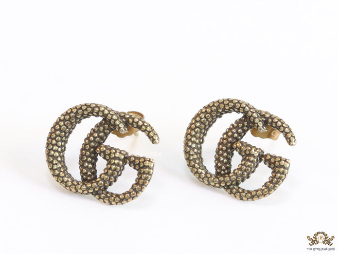 Antique gold plated double G motif studs with honey comb texture