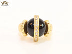 Double gold Medusa with CZ on black ball ring
