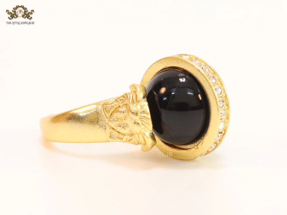 Double gold Medusa with CZ on black ball ring